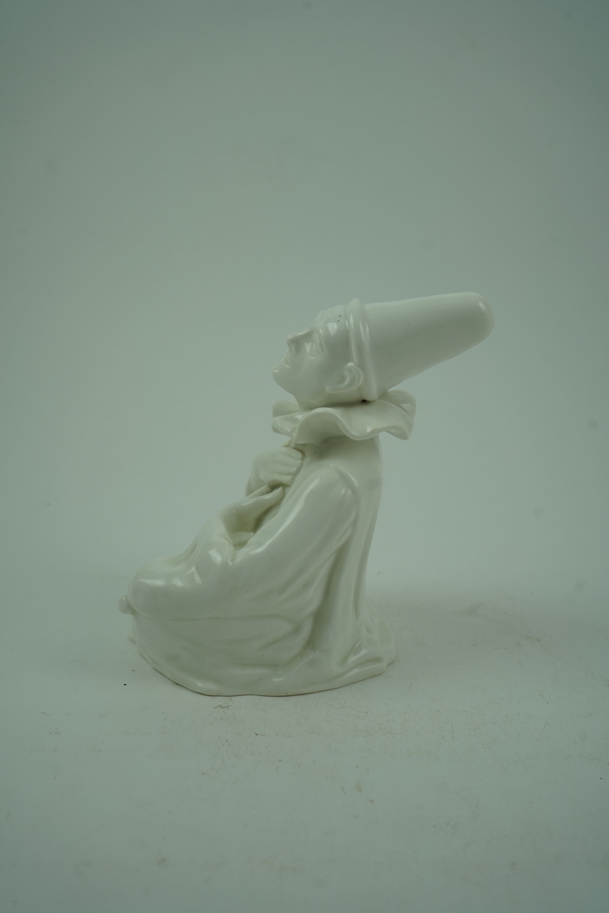 Charles J. Noke (1858-1941) for Royal Doulton: 'Sentimental Pierrot'